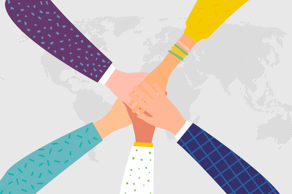 A group of people holding hands in front of a world map showcasing 5 reasons why infographic designs are perfect for internal communications.